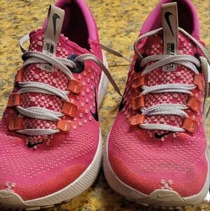 Nike react bright pink tennis shoe